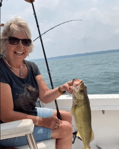 A person enjoying fishing in NY