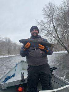 Fisherman with a 23-inch catch in Pulaski