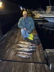 Angler fishing in Pulaski with two fish