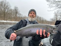 Photograph of a 27-inch rainbow trout caught while fishing in NY