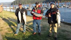 Three pink salmon being caught while fishing in OR