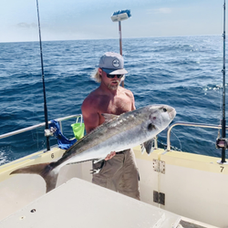 A lone angler reeling in a fish in Jacksonville