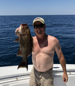 Angler with a single fish caught in Panama City