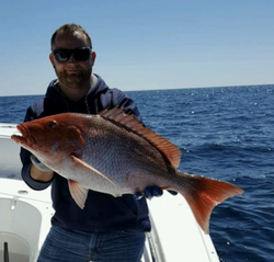 Angler with a 26-inch fish catch in Florida