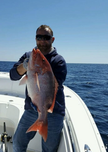 Fisherman with a 25-inch catch in FL