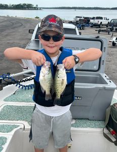 Two white crappie and crappie fish caught in Mannford