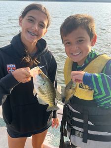 Two white crappie fish caught while fishing in OK