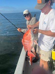 Three people fishing in Mannford