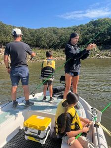 A person fishing in Mannford