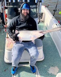 Angler with a fishing rod in Mannford