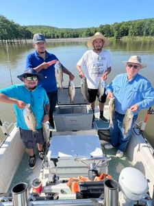 Successful fishing trip on lake in Mannford OK with multiple fish caught