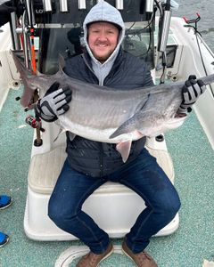Angler holding large fish in Mannford