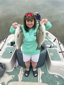 Two wiper (hybrid striped bass) fish caught in Mannford