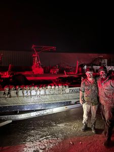 Two people fishing at Port Mansfield