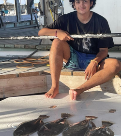 A pair of anglers enjoying a fishing trip in Port Mansfield, Texas