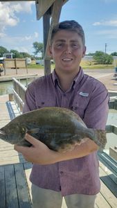 Fisherman casting line in Port Aransas