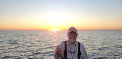 Angler enjoying a day of fishing and hunting at Matagorda