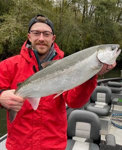 Angler with a big fish caught while fishing in Oregon