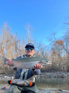Angler with rainbow trout in New York