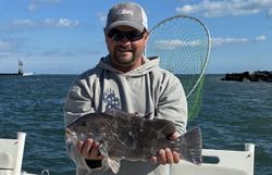 A person fishing in the waters of West Ocean City