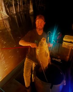 Angler with a big 22-inch fish in the Orange location