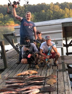 4 people fishing in Orange
