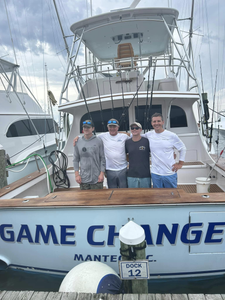 Four people enjoying a fishing trip in Nags Head