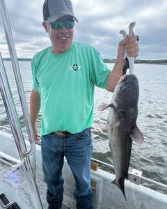 Angler with a 22-inch fish caught in Sand Springs