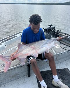 Angler with a 29-inch catch at Sand Springs