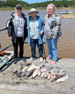 3 people fishing on sand in Sand Springs