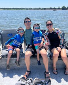 Four people enjoying a day of fishing in Sand Springs
