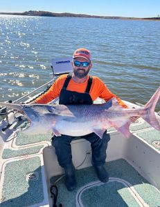 A fisherman with a big catch in Sand Springs