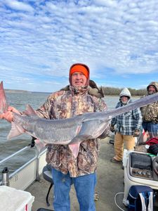 Three people fishing for the best, great catch at Sand Springs.