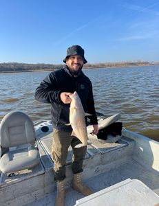 Two people fishing at Sand Springs location