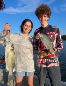 Two striped bass caught during a fishing trip in Sand Springs