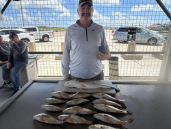 Two anglers fishing with rod and reel in Texas