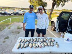 Two people enjoying fishing in Lewisville