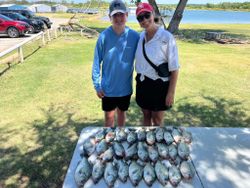 Two people fishing in Lewisville