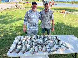 Two people fishing in TX