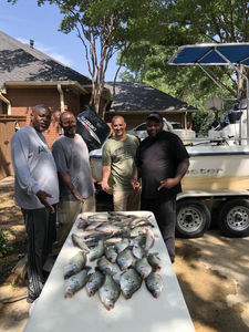 4 people enjoying fishing in TX