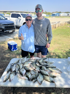 Two people fishing in TX