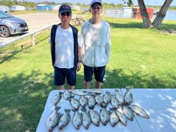 Two people fishing in Lewisville