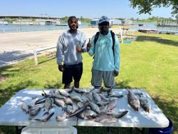 Two people fishing in TX
