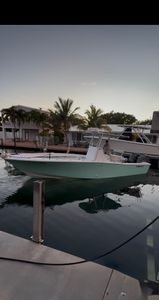 Fishing boat docked at marina in Bridge FL during evening hours