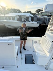 Fishing charter boat deck in Florida waters with caught fish