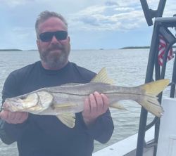 Photograph of a 23-inch snook caught during a fishing trip in FL