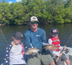 Two anglers enjoy a great day of fishing in Cape Coral