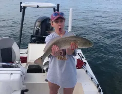 Angler with a large redfish caught in Cape Coral