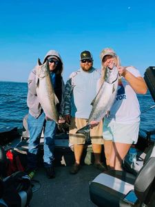 Two bluefish and rainbow trout caught fishing in NY