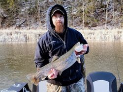Angler holding a 21-inch fish in NY
